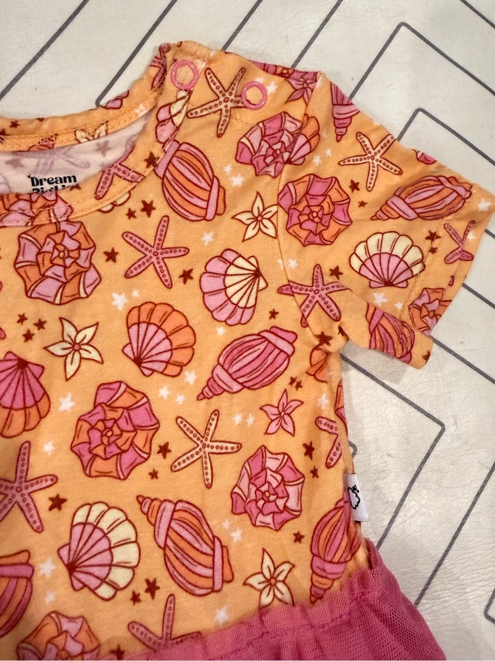 Dream Big Little Sea Shell Print One-Piece with Pink Tulle Skirt